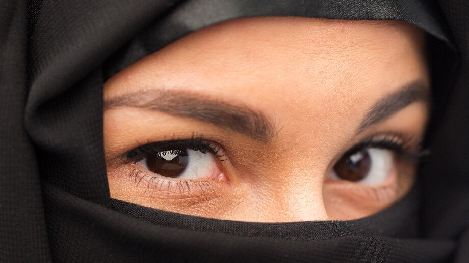 religious and people concept &#8211; close up of muslim woman in hijab